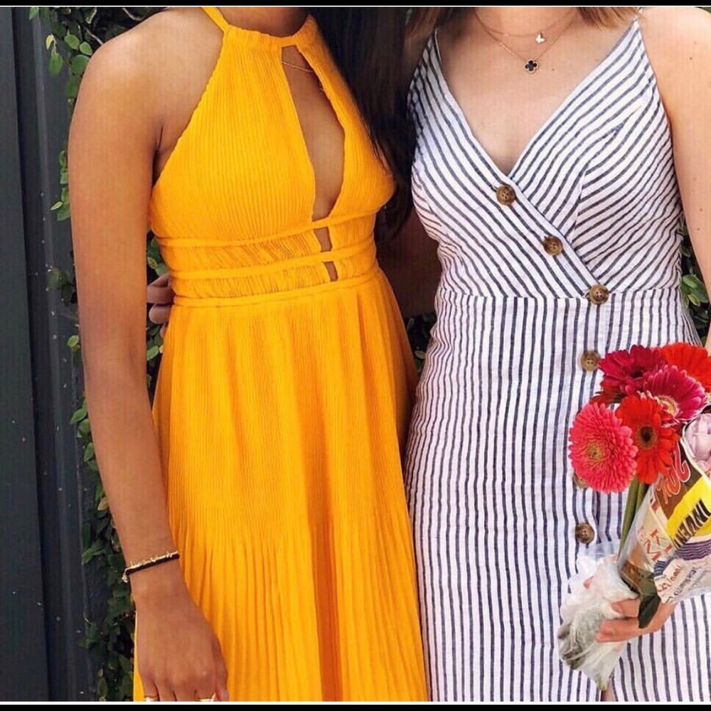 yellow pleated halter dress